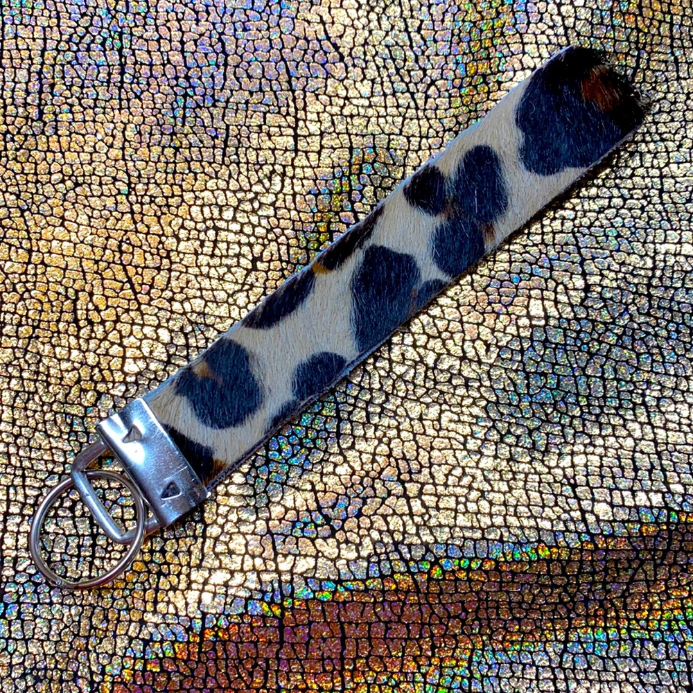 Cheetah hair on keychain wristlet.